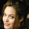 Angelina Jolie tattoo sparks rumors about her seventh child