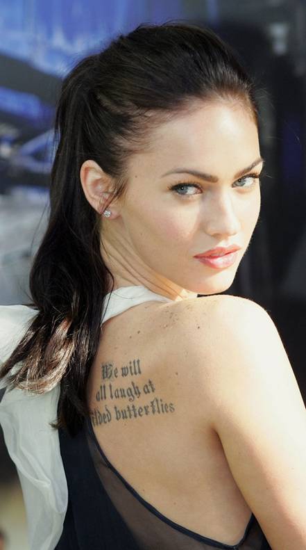 megan fox rib tattoo. megan fox tattoos back.