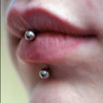 Vertical lip piercing