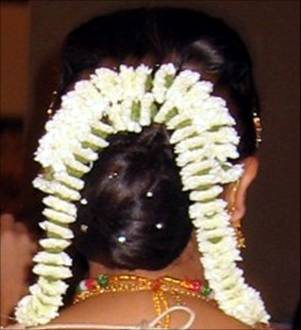 Indian bridal hairstyles / flower adornment