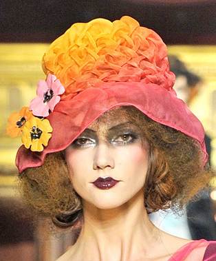 colorful hats with floral embellishments spring summer 2011 John Galliano