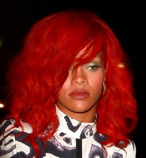 rihanna hair red curly. Rihanna medium length curly