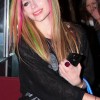 Avril Lavigne sports pink green streaked hair