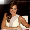 Ashley Tisdale side swept loose pony tail