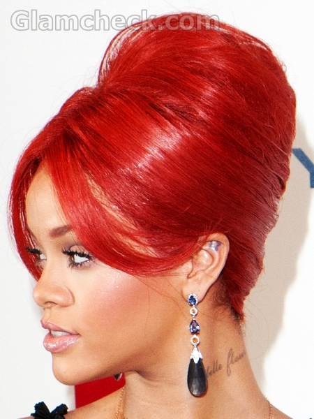 rihanna red hairstyles. Rihanna red hair top bun
