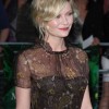 Kirsten-Dunst-Demure-in-50s-Inspired-Dress-at-Melancholia-Premiere