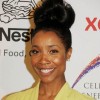 Sleek extured top-knot bun Kita Williams