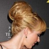 messy top bun braid hairstyle adrienne frantz