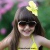 Beach hairstyle kids flower