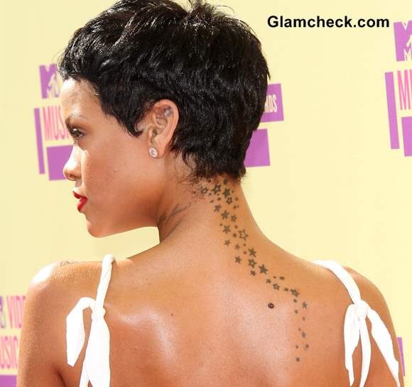 Rihanna’s Trailing Stars Neck and Back Tattoo