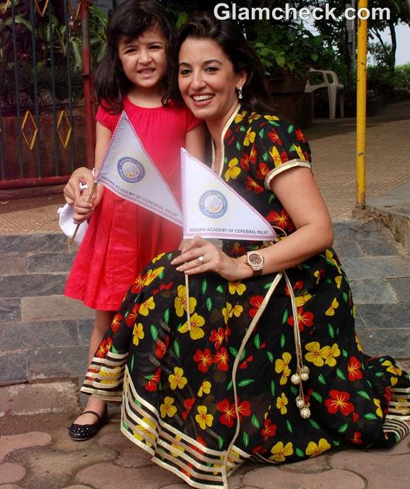 Perizaad Zorabian with daughter flag off rally the cerebral palsy