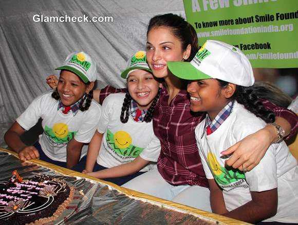 Isha Koppikar Celebrates 37th Birthday with Smile Foundation Kids