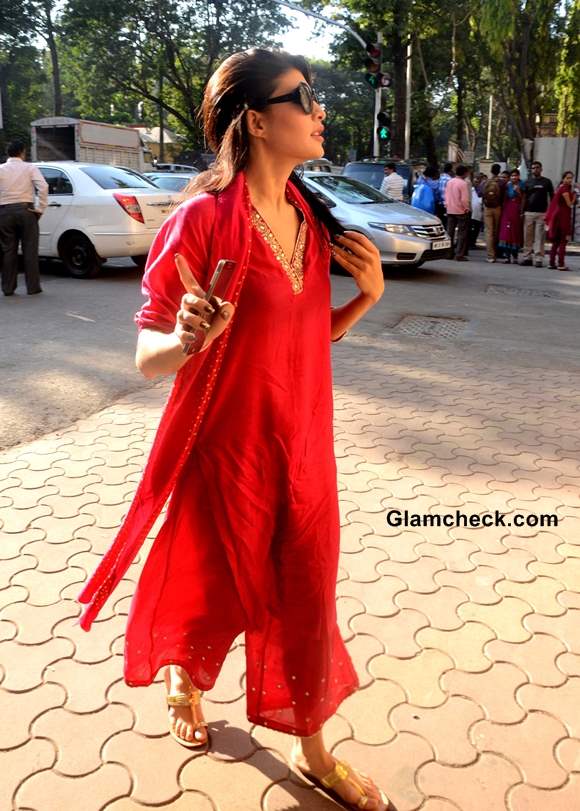 Jacqueline Fernandez in red suit Fights to Ban Horse-drawn Carriages in Mumbai