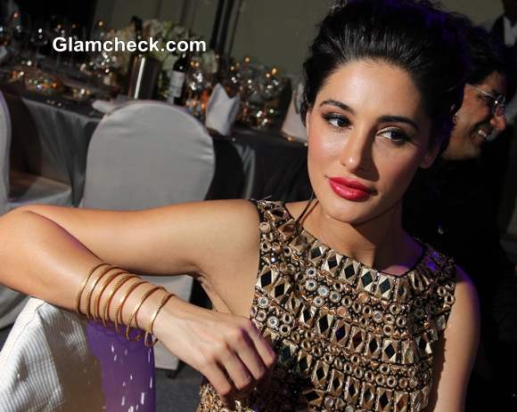 Nargis Fakhri at amfAR India 2013