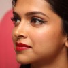 Deepika Padukone Winged eyeliner and red lips makeup