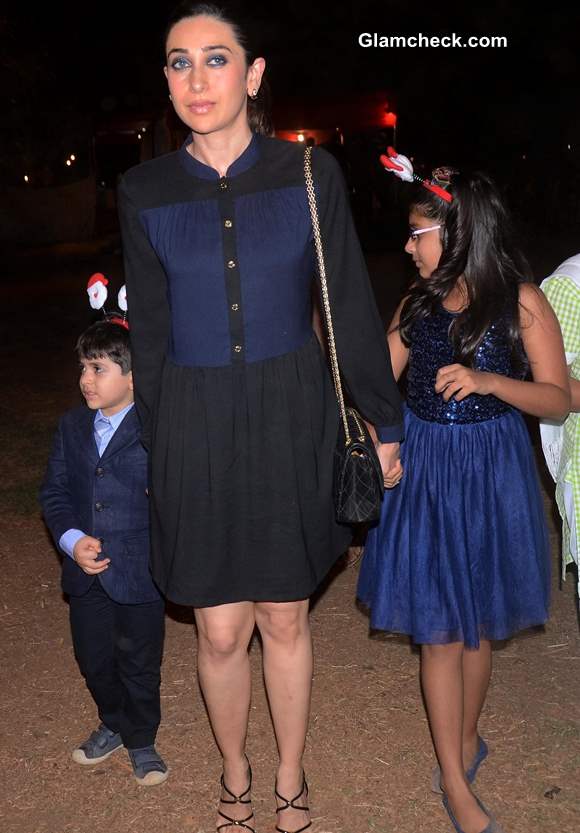 Karisma Kapoor with her kids at the Midnight Mass on Christmas Eve 2013