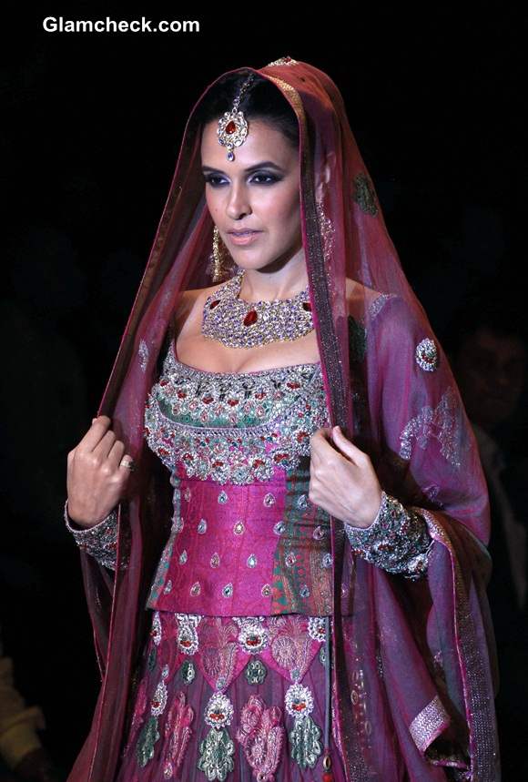 Neha Dhupia in Ashima and Leena Singh Lehenga Choli at IIJW 2014