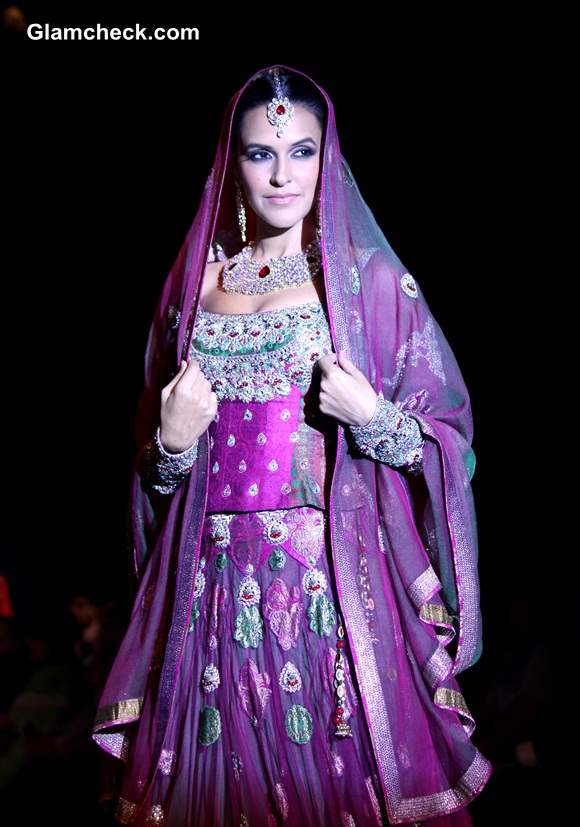 Neha Dhupia in Ashima and Leena Singh Lehenga Choli at IIJW 2014 — Indian  Fashion