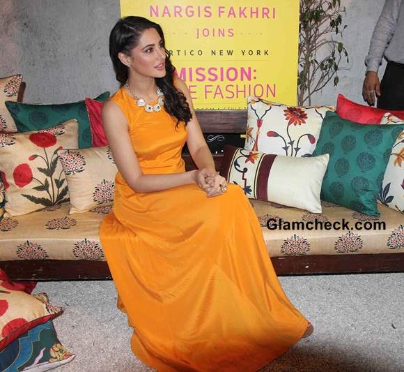 Nargis Fakhri Lights Up the Room in Orange Maxi