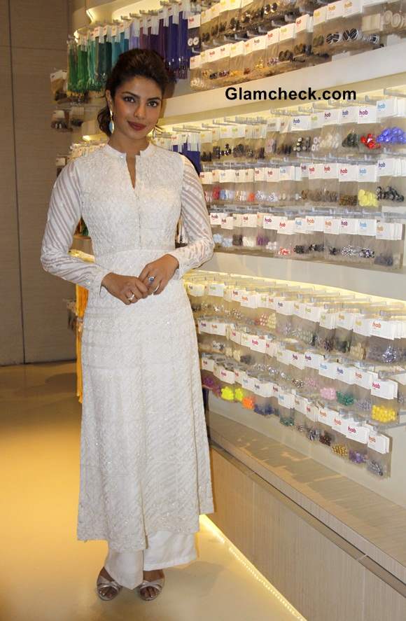Priyanka Chopra in white anarkali suit by Anita Dongre