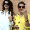 Tanishaa Mukherjee and her mother Tanuja after casting their vote in the Assembly elections for Maharashtra state