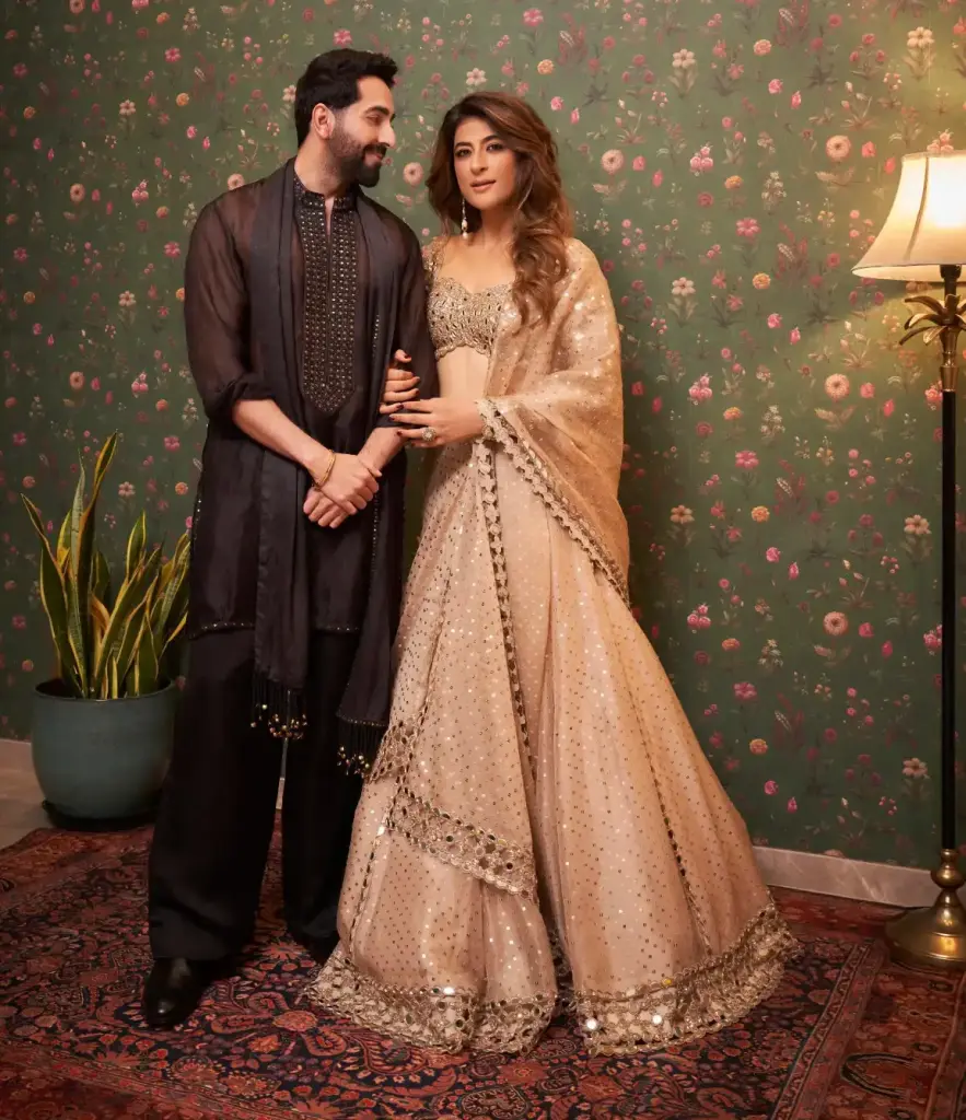 Ayushmann Khurrana in loose black trousers with a matching delicately embellished stole