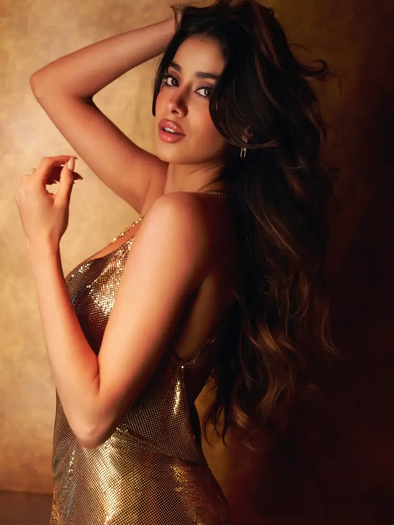 Janhvi Kapoor wearing a metallic-finish look for the talk show