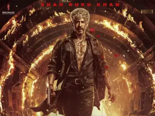 Shah Rukh Khan holds a red rose between his lips against blazing flames in the new King poster.