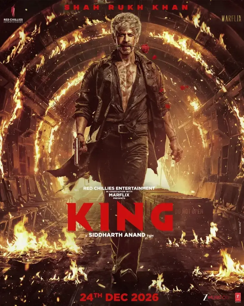 Shah Rukh Khan holds a red rose between his lips against blazing flames in the new King poster.