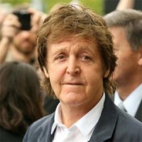 Sir Paul McCartney trips on stage