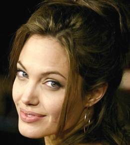 Angelina Jolie tattoo sparks rumors about her seventh child