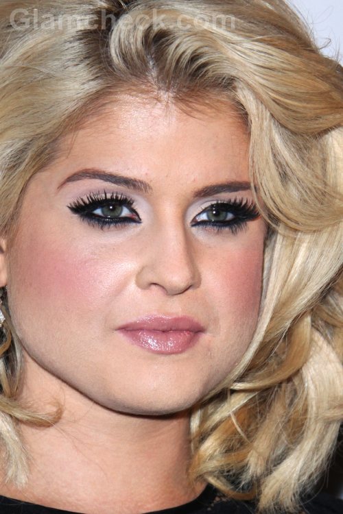 Kelly Osbourne joins winehouse family at Tribute