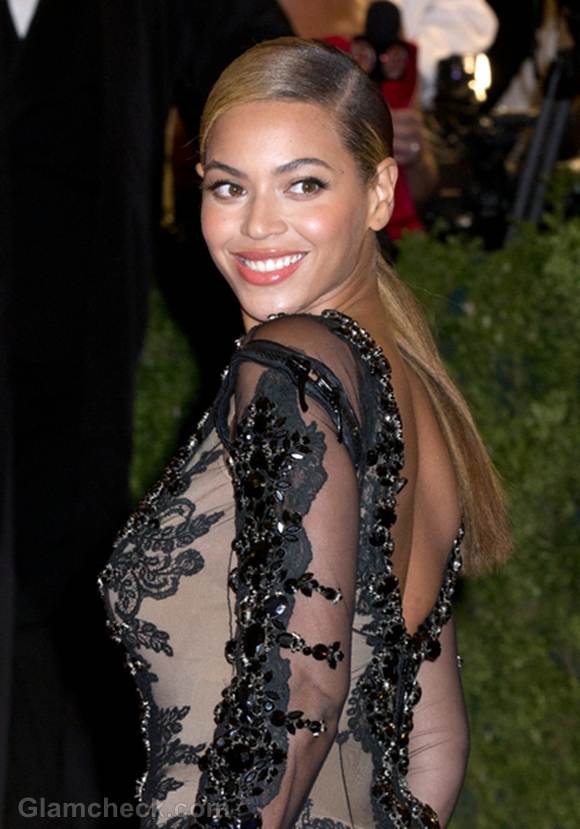 Beyoncé leaves little to the imagination in Prada hot pants, see-through top