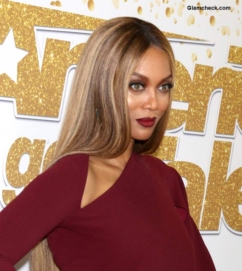 Tyra Banks Dons A Burgundy Gown At The Agt Live Show Red Carpet