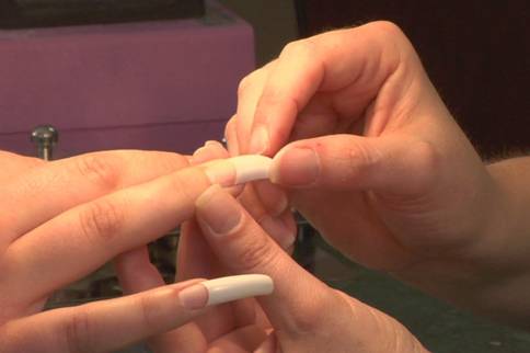 Apply acrylic nails