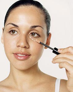 applying concealer