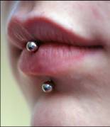 vertical lip piercing