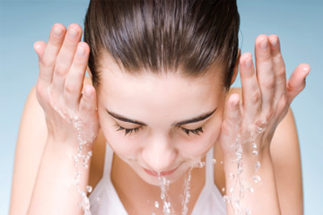 girl washing face