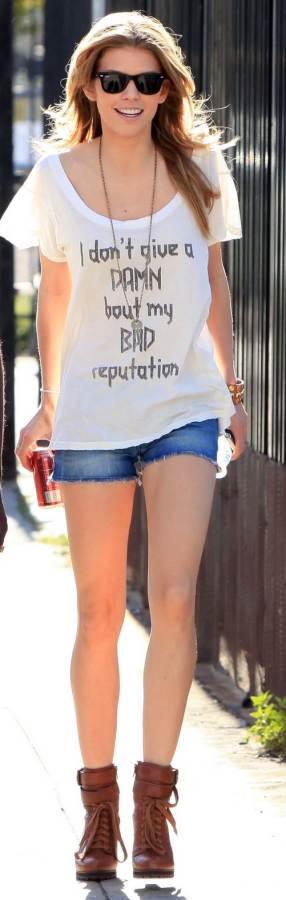 wearing White T-shirt with denim shorts