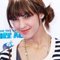 Denyse Tontz sports bangs with side knot