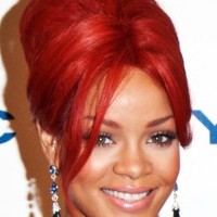 Rihanna fiery red top bun Hairstyle