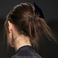 Hairstyle How To Messy Looped Under Ponytail