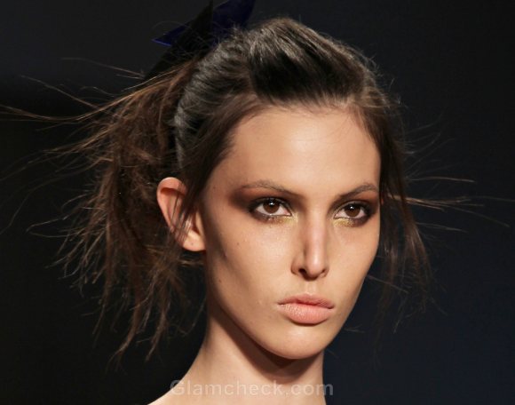 Hairstyle How To : Messy Looped Under Ponytail