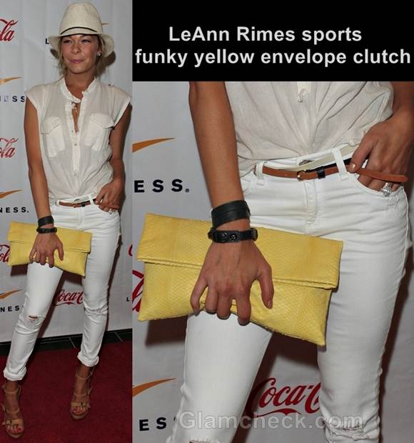 yellow envelope clutch with white pants LeAnn Rimes