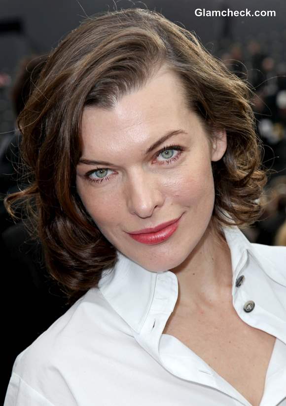 Milla Jovovich Androgynous at Paris Fashion Week F-W 2013