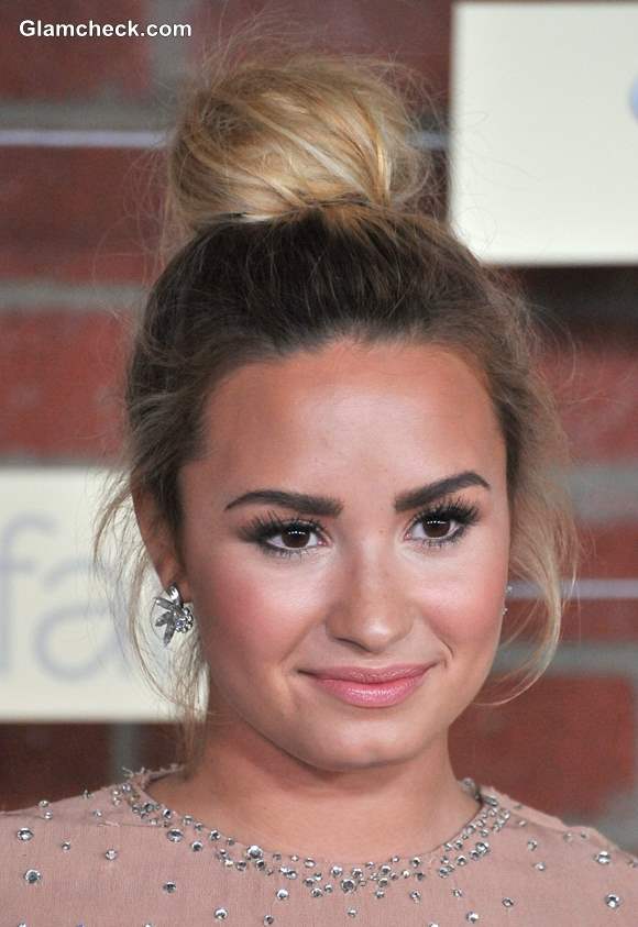 Demi Lovato Softly Sensuous Top Knot Bun Hairstyle