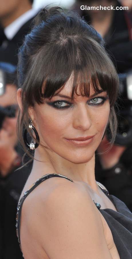 Hairstyling Fine Hair like Milla Jovovich Bun with Bangs