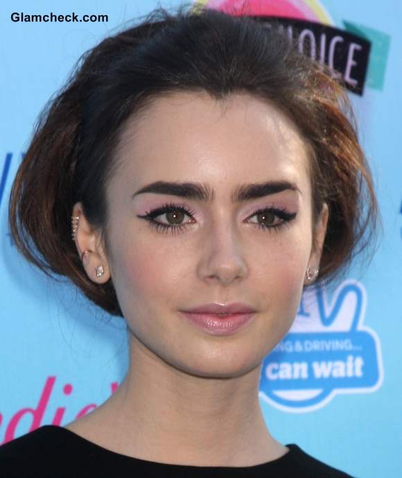 Lily Collins in 60s Hairstyle and Makeup