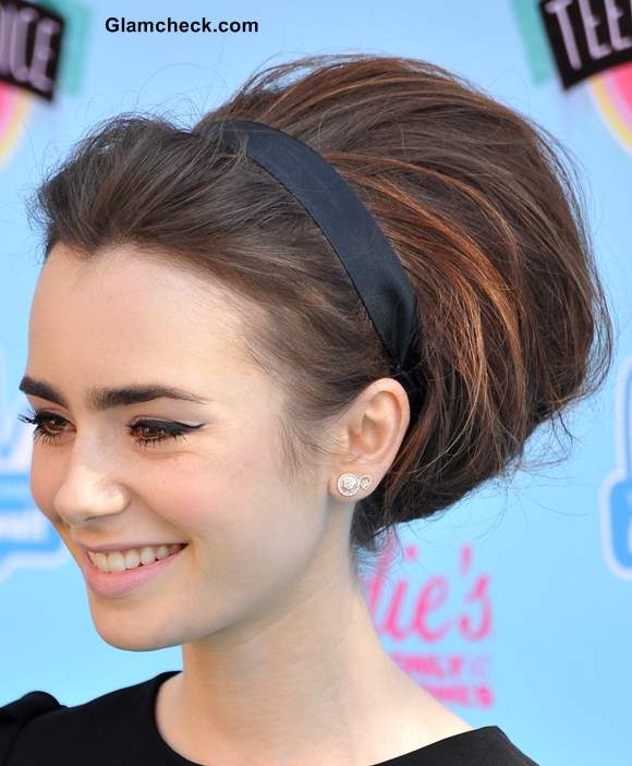 Lily Collins in 60s Style Bun and Makeup