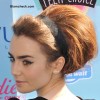 Lily Collins in 60s Style Bun and Makeup 2013